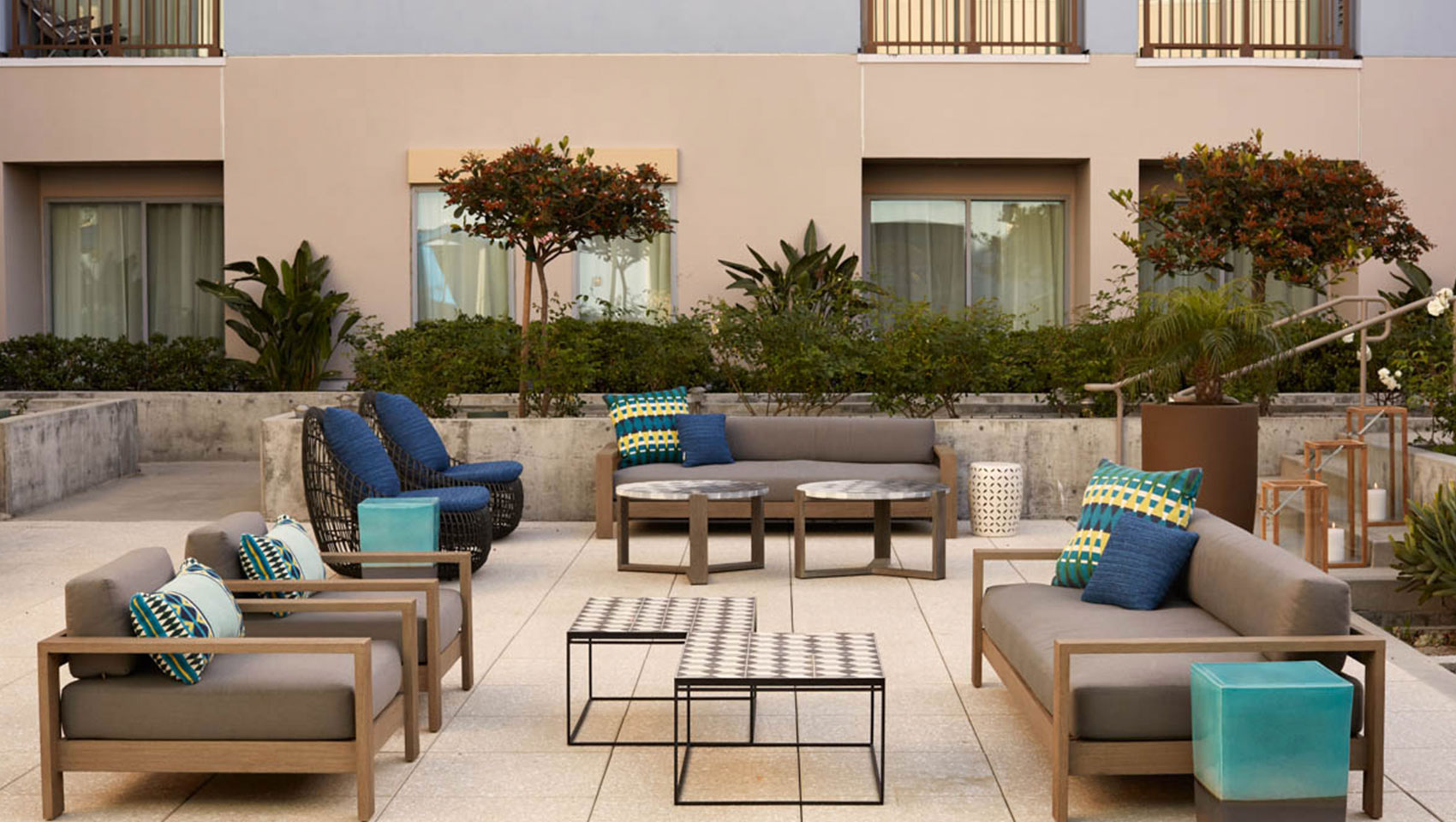 Outdoor deck seating at Kimpton Shorebreak Resort