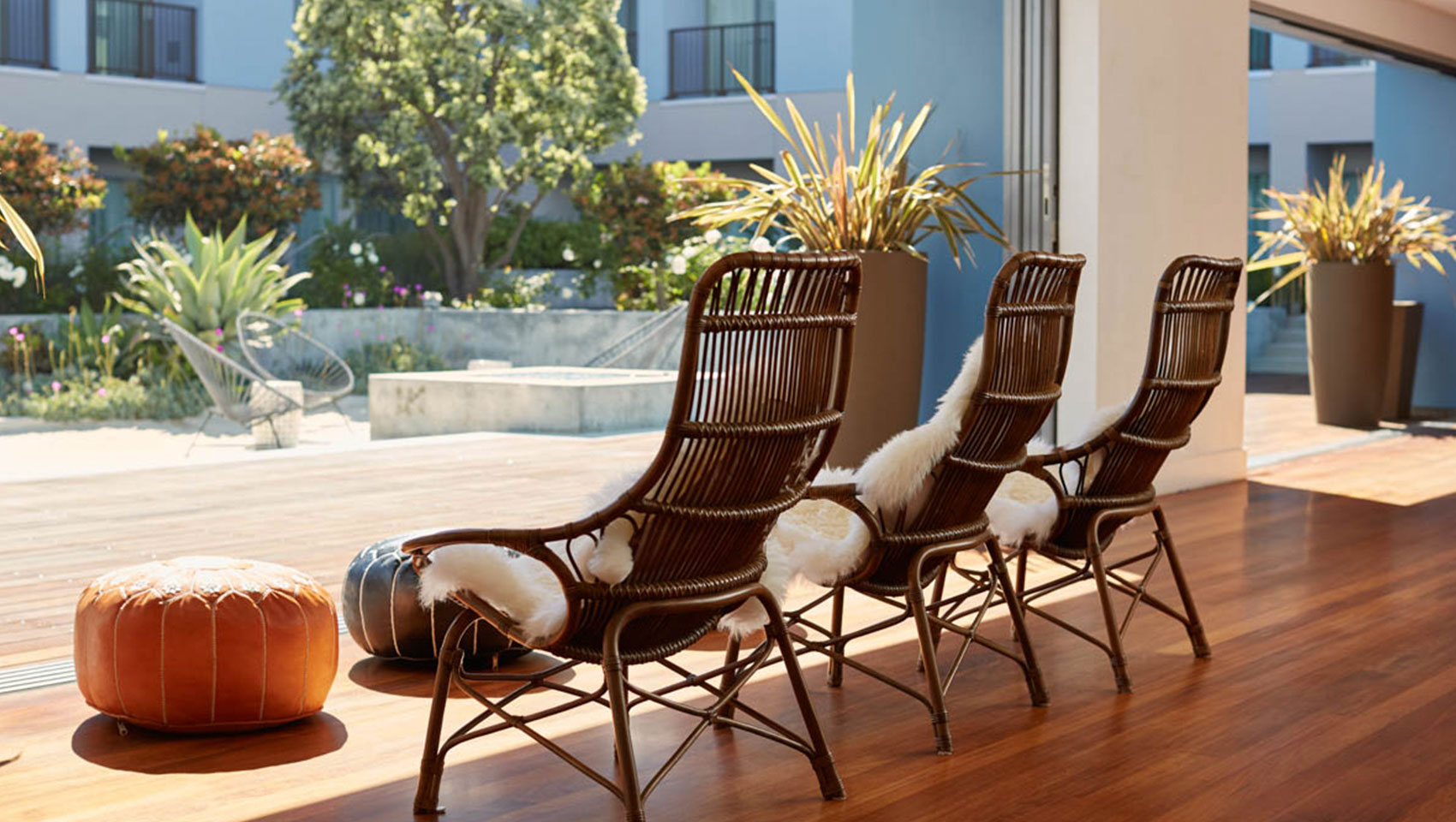 Chairs in lobby looking out at deck at Kimpton Shorebreak Resort
